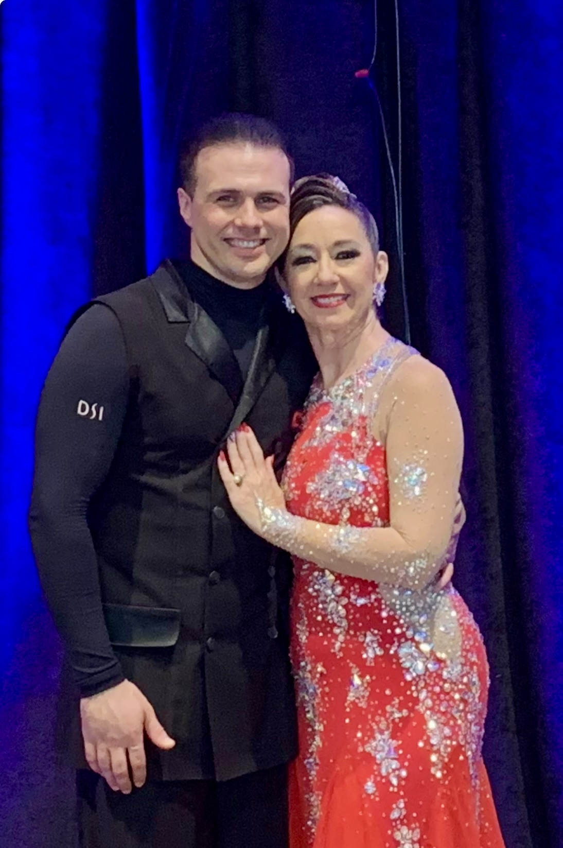 Showcase couple in red gown